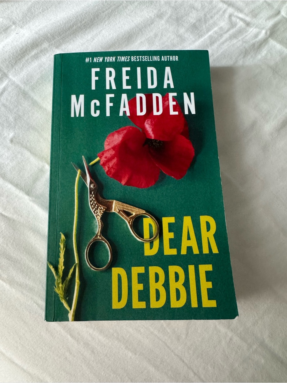 Dear Debbie by Freida McFadden - Green Cover with Red Flower